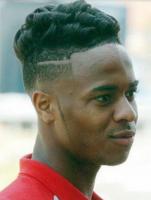 Black men undercut hairstyle with wavy curly hair on top.JPG
