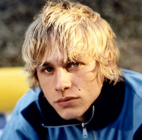 Charlie Hunnam with his layered hairstyle with long layered bangs
