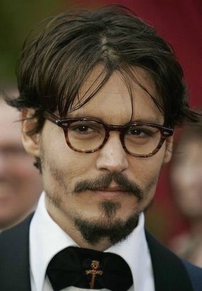 Johnny Depp medium hairstyle with long side bangs.jpg
