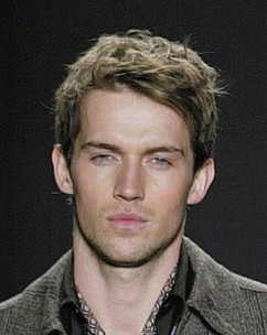 Image of short messy haircut men with wavys and layers on the top
