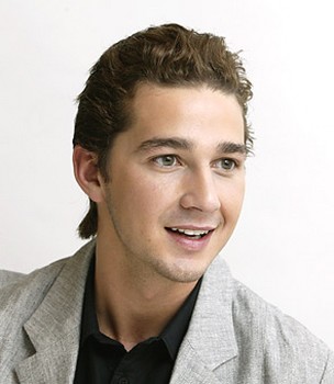 Shia LaBeouf with wavy front hairstyle with flip in back.jpg
