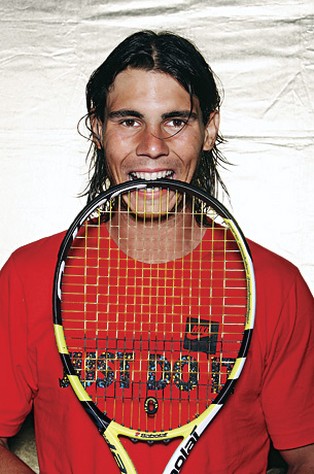 Rafael Nadal Rafael+Nadal+in+weat+hair_Nadal+racket
