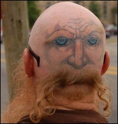 Funny haircut and tattoo combination - eyes in the back of the head.jpg
