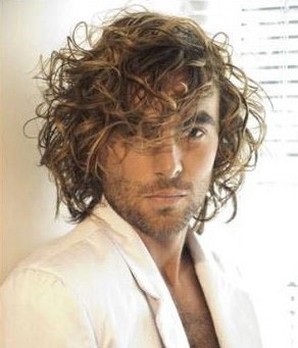 Long medium messy curly hairstyle for men.jpg
