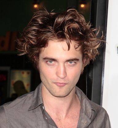 Robert Pattinson with long medium wavy haircut with his wild sexy look.JPG
