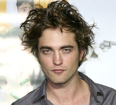 Actor Robert Pattinson image with his long spiky hair looking wild and sleepy at the same time.JPG

