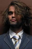 High light men long layered haircut with very long bang in two tones.JPG
