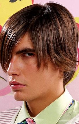 Medium layered man hairstyle in brown color with long side bangs.JPG
