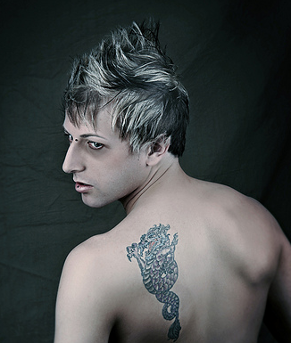 Cool man hairstyle with spiky hair on the top and layers.PNG

