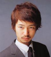 Medium Asian man hair style with side-part bangs, redish brown