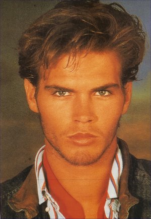 Medium wavy hair style for men, brown