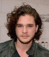 Young Kit Harington pictures with his curly hairstyle.JPG
