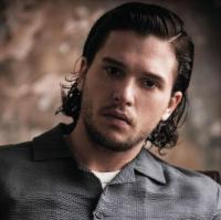Kit Harington photos with his wavy medium hairstyle with long pulled back hair.JPG