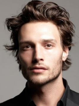 Men light curly hairstyle with medium long length and bangs pulled back.PNG
