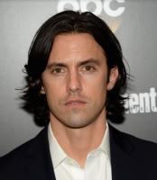 Milo Ventimiglia pictures with his medium long hairstyle with layers and long side bangs.JPG