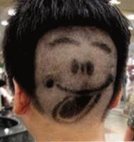 Unique haircut with happy face tongue sticking out.JPG