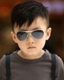 Cool Asian little boy hairstyle with layers with long layered bangs.JPG
