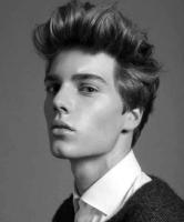 2015 mens hairstyle with medium wavy hair and long bang pulled up.JPG