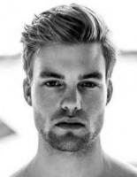Short layered men's hairstyle with with long thick bang.JPG
