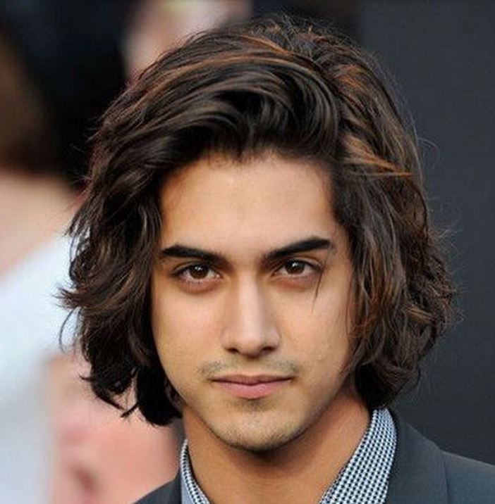 Sexy Latino men hairstyles with medium long hairstyle with waves and layers.JPG
