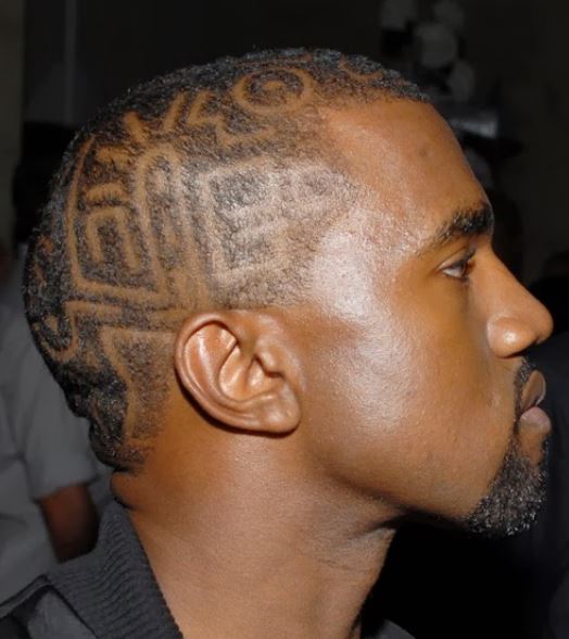 Black male celebrity haircut with undercut hair with cool patterns.JPG
