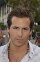 Ryan Reynolds with his medium layered hairstyle with spiky bangs.JPG