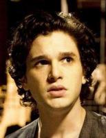 Kit Harington picture with his medium short curly hairstyle.JPG
