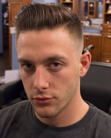 Trendy mens hairstyle with cool undercut hair and long long hair on the top