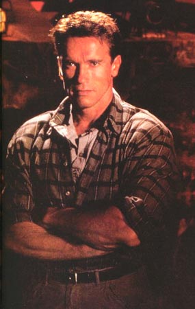 Arnold Schwarzenegger with Short Wavy Hair Style
