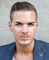 Trendy mens hairstyle with geled hair and very short hair in the back.PNG
