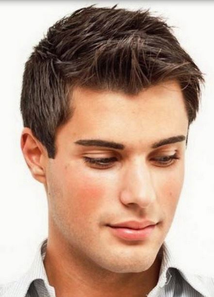 Mens professional hairstyle with short layered hair and spiky bang