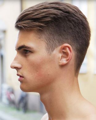 Modern mens hairstyle with cool undercut and thick layered hair on the top
