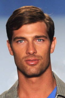 Men trendy hairstyle with a classic style and bang on swept on the side