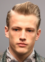 Mens cool haircuts with short length hair in the back and long geled long bangs.PNG