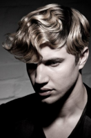 Cool men haircuts with wavy long longs swept to the side.PNG