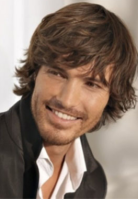 Men medium layered hairstyle with spiky ends and long layered bangs.PNG
