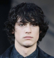 Medium long trendy hairstyle for young man in lack hair and long long bangs.PNG