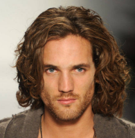 Trendy men long curly haircuts with very long wavy bangs.PNG