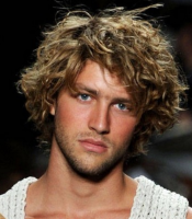Hot men hairstyles with light curls and full of volume and long bangs.PNG