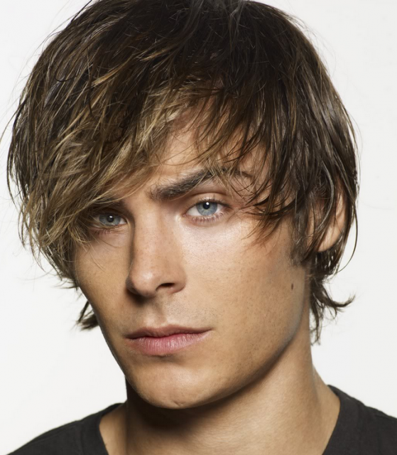 Chic young men hairstyle with long layered bangs with medium short hair length in the back.PNG
