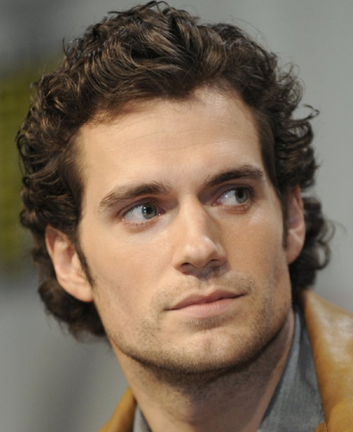 Henry Cavill pictures with his medium long curly haircuts with curly bangs.PNG
