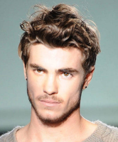 Newest mens haircuts picture with wavy hair and full bangs.PNG