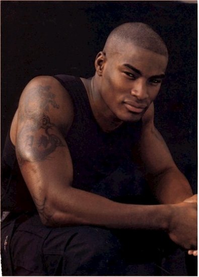 Tyson Beckford with Bald Hair Style