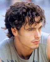 Medium short men hair style with wavy curls