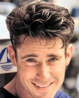 men hairstyle with wavy bang, brunette.jpg