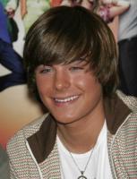 Zac Efron with medium hairstyle with bangs.jpg
