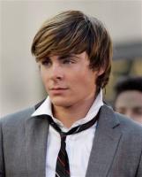 Zac Efron with stylish haistyle with long side bangs.jpg