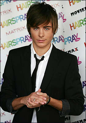 Zac Efron with two toned layered hairstyle.jpg