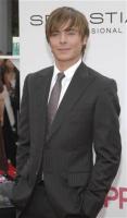 Zac Efron with long medium hairstyle with layered bangs.jpg