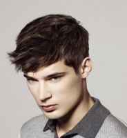 Trendy 2013 men hairstyle with cool wavy bangs with short hair length.PNG